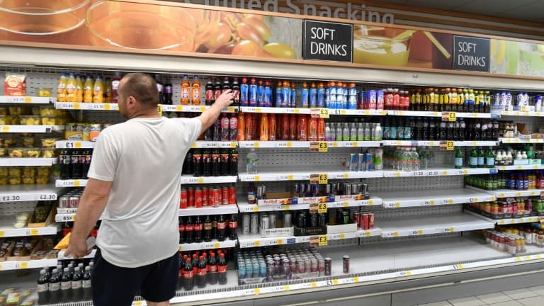Des étagères vides dans un supermarché Tesco à Londres le 22 juillet 2021 - JUSTIN TALLIS © 2019 AFP